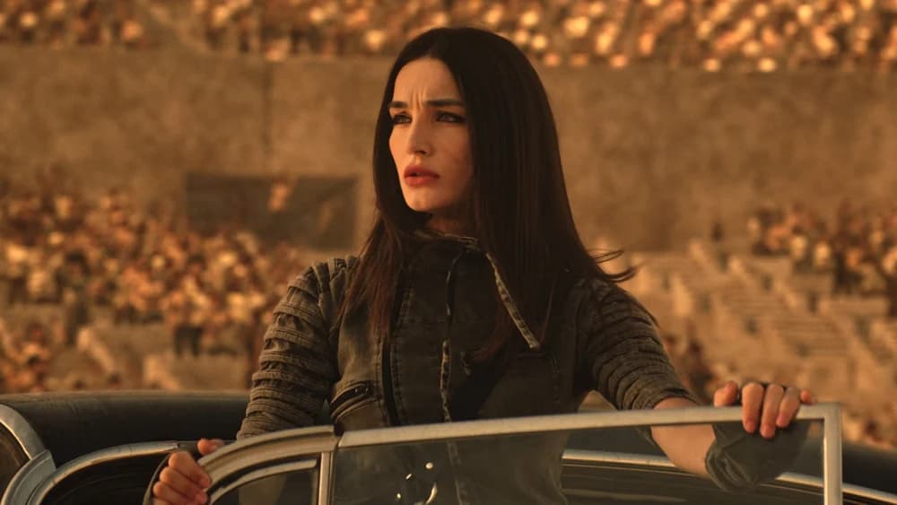 Woman in a convertible at a stadium, music video cinematography by Mark Hobz